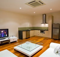 Indulge Apartments - Hotel Accommodation