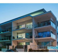 Unwind at 29 Breeze Penthouse - Hotel Accommodation