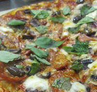 Mezzadellas Woodfired Pizza and Tapas - Hotel Accommodation
