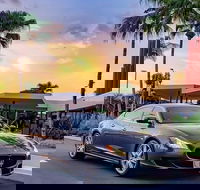 Maserati Quattroporte Limousine Transfer Cairns Airport to City - Hotel Accommodation