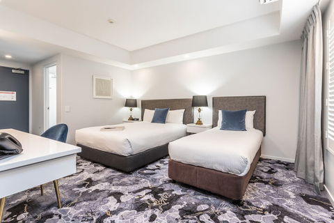 Kingsford Smith Motel - Hotel Accommodation 7