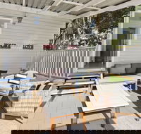 Flynns Beach Caravan Park - Hotel Accommodation