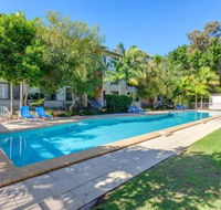 Baden 42 Rainbow Shores Ground floor unit air conditioned overlooking outdoor spa - Hotel Accommodation