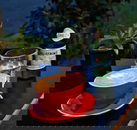 The Cracked Cup Cafe  Pizzeria - Hotel Accommodation