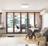Beachfront Manly Apartment With Parking and Balcony - Hotel Accommodation